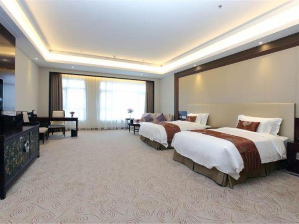 Linyi Blue Horizon International Hotel Yi He Exterior foto